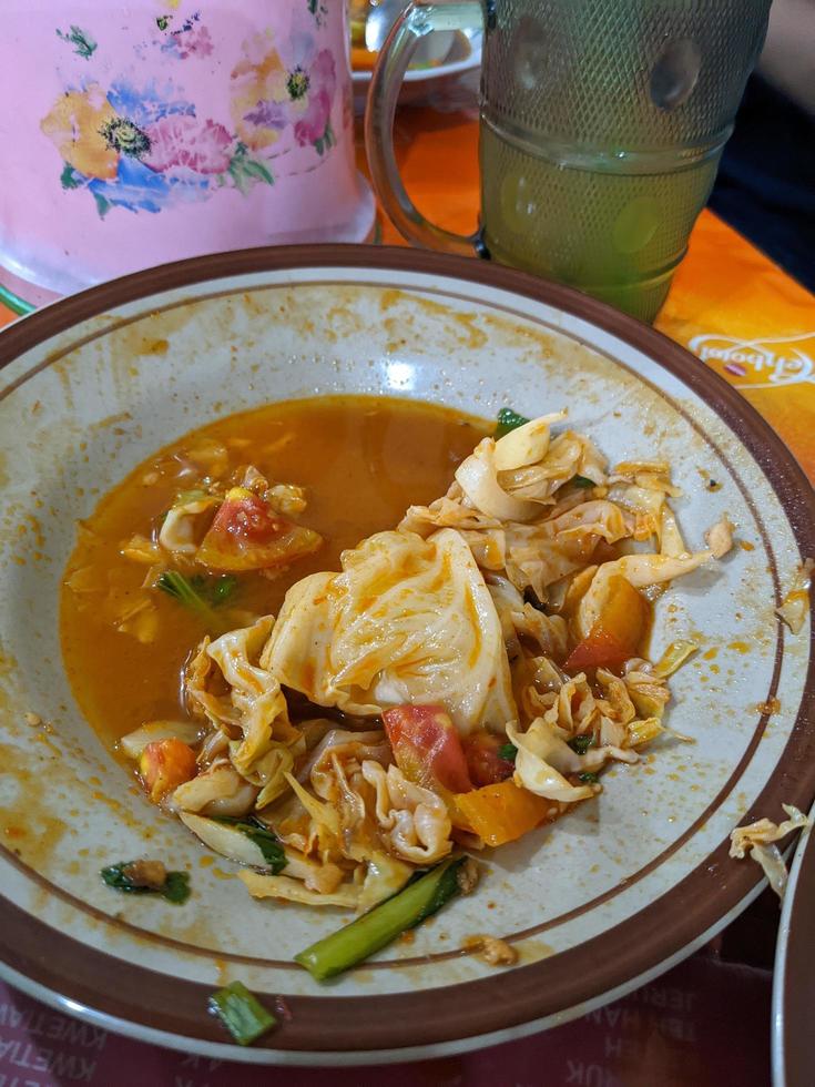 Plate and bowl after finish dinner on the traditional restaurant. The photo is suitable to use for food background, poster and food content media.