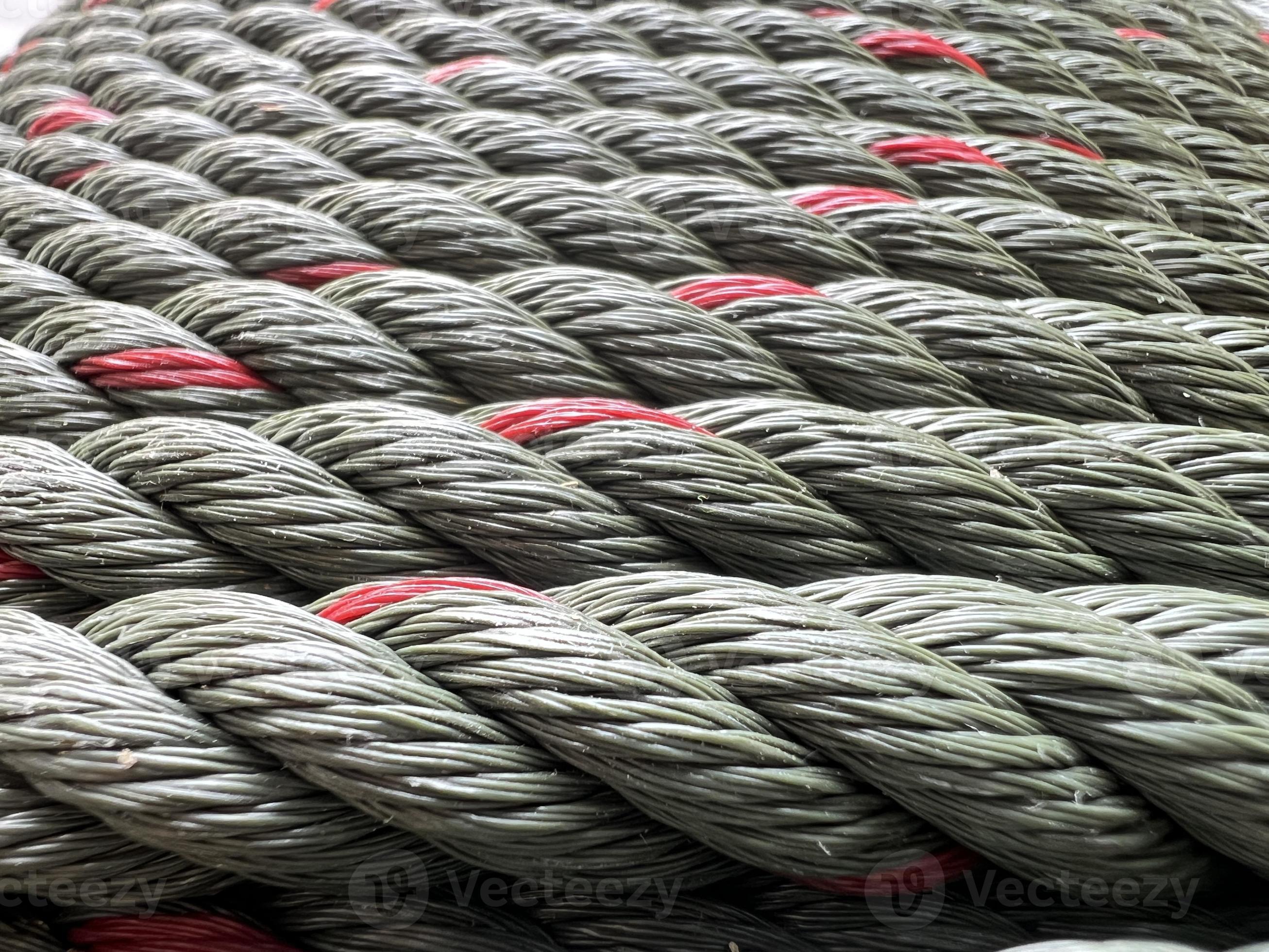 Closeup shot of rope, with tiny fibers woven together into ropes