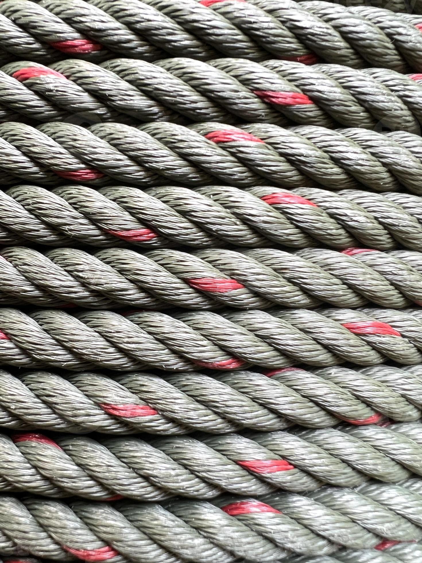 Closeup shot of rope, with tiny fibers woven together into ropes