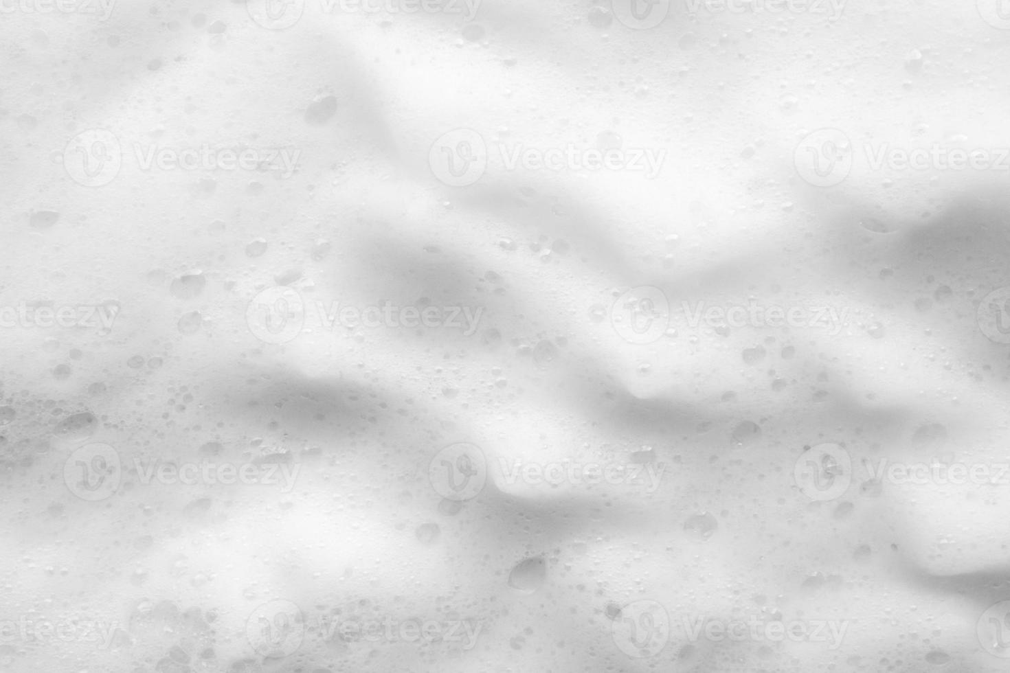 Abstract white soap foam bubbles texture background photo