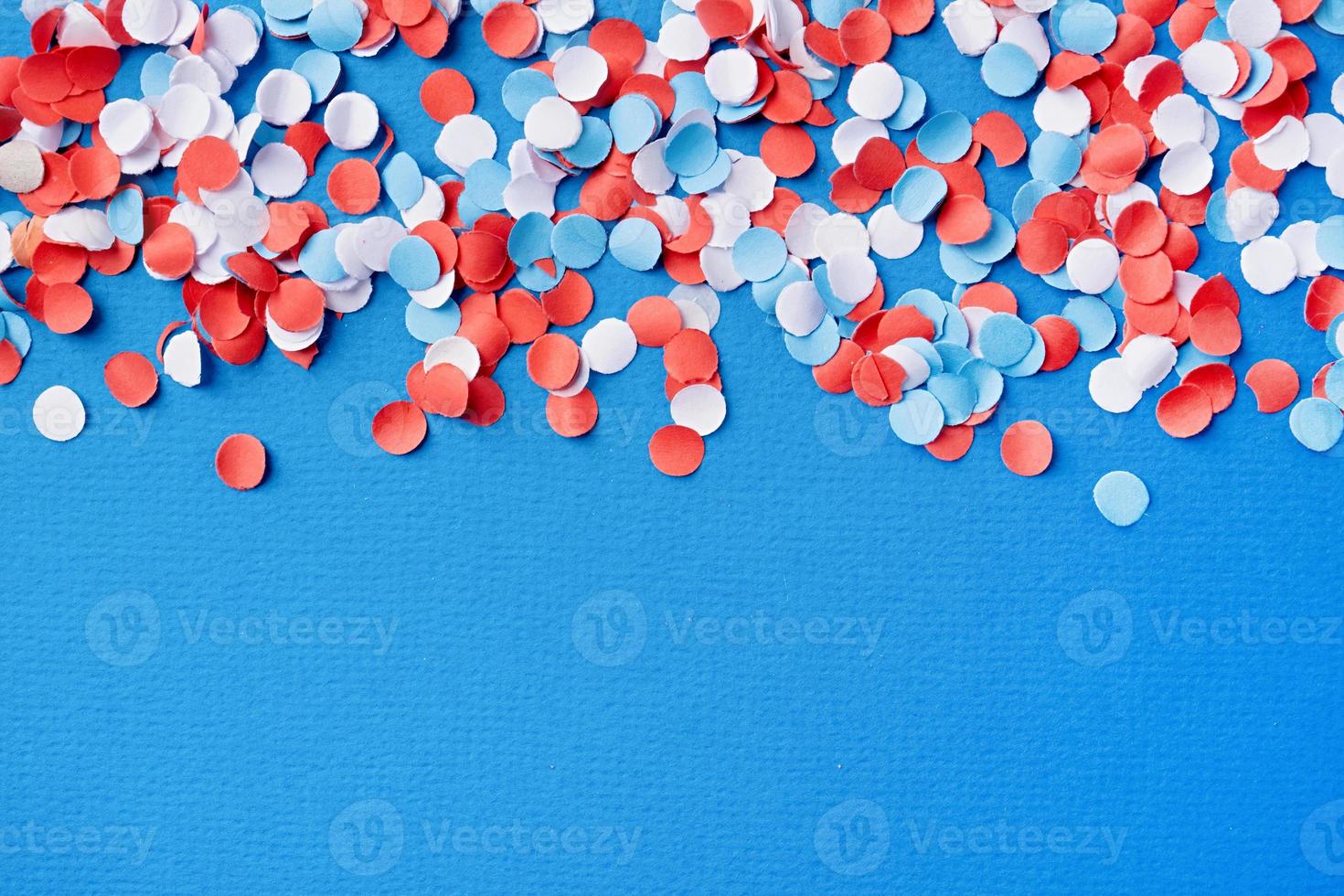 colorful circle shape confetti from shredded paper , decorations for fourth july photo