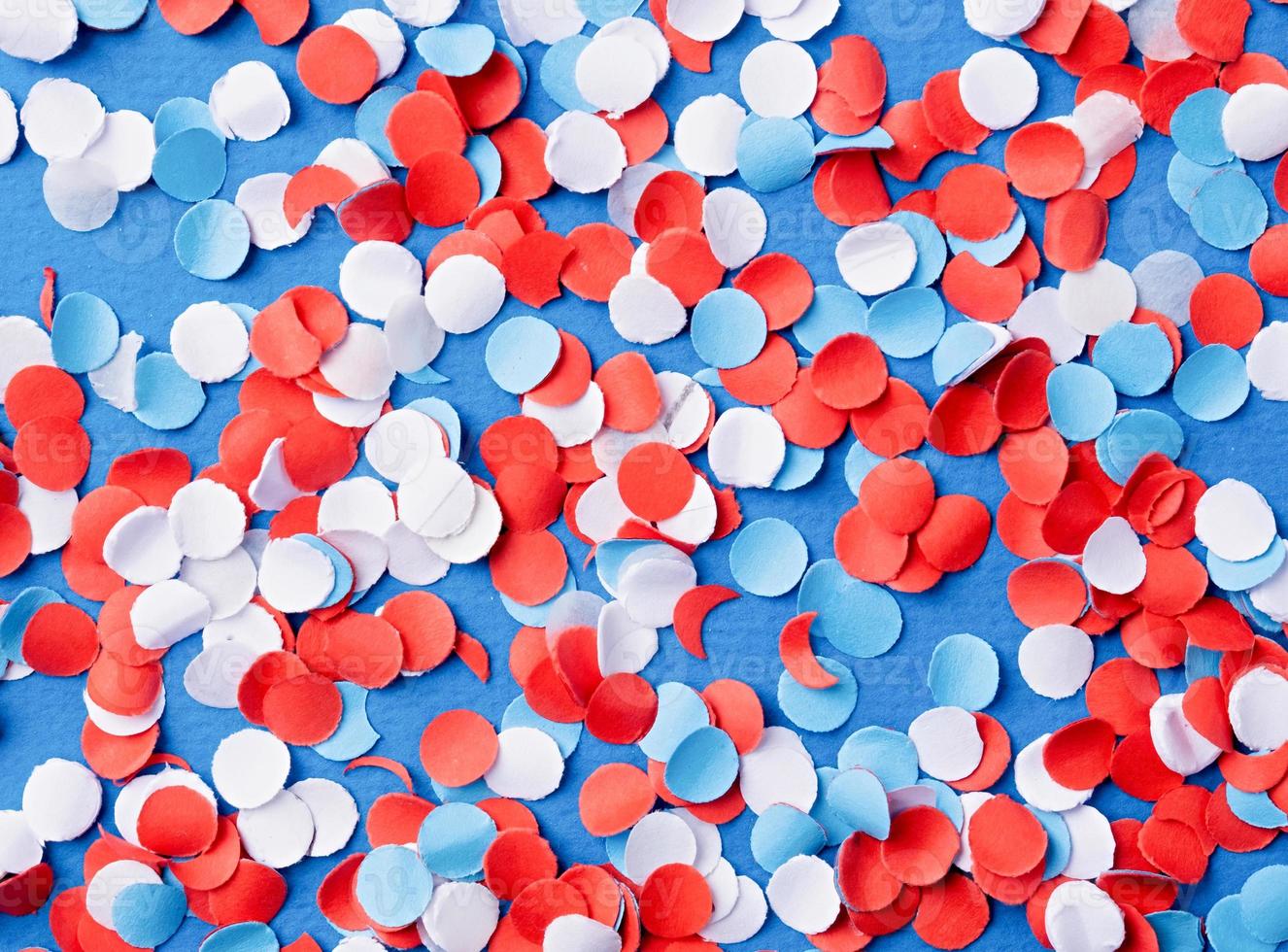 colorful circle shape confetti from shredded paper , decorations for fourth july photo
