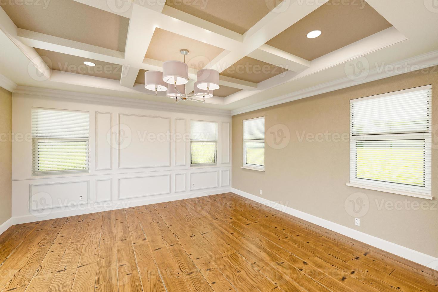 Beautiful Tan Custom Master Bedroom Complete with Entire Wainscoting Wall, Fresh Paint, Crown and Base Molding, Hard Wood Floors and Coffered Ceiling photo
