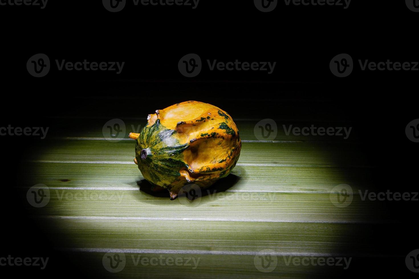 decorative pumpkin on a dark background photo