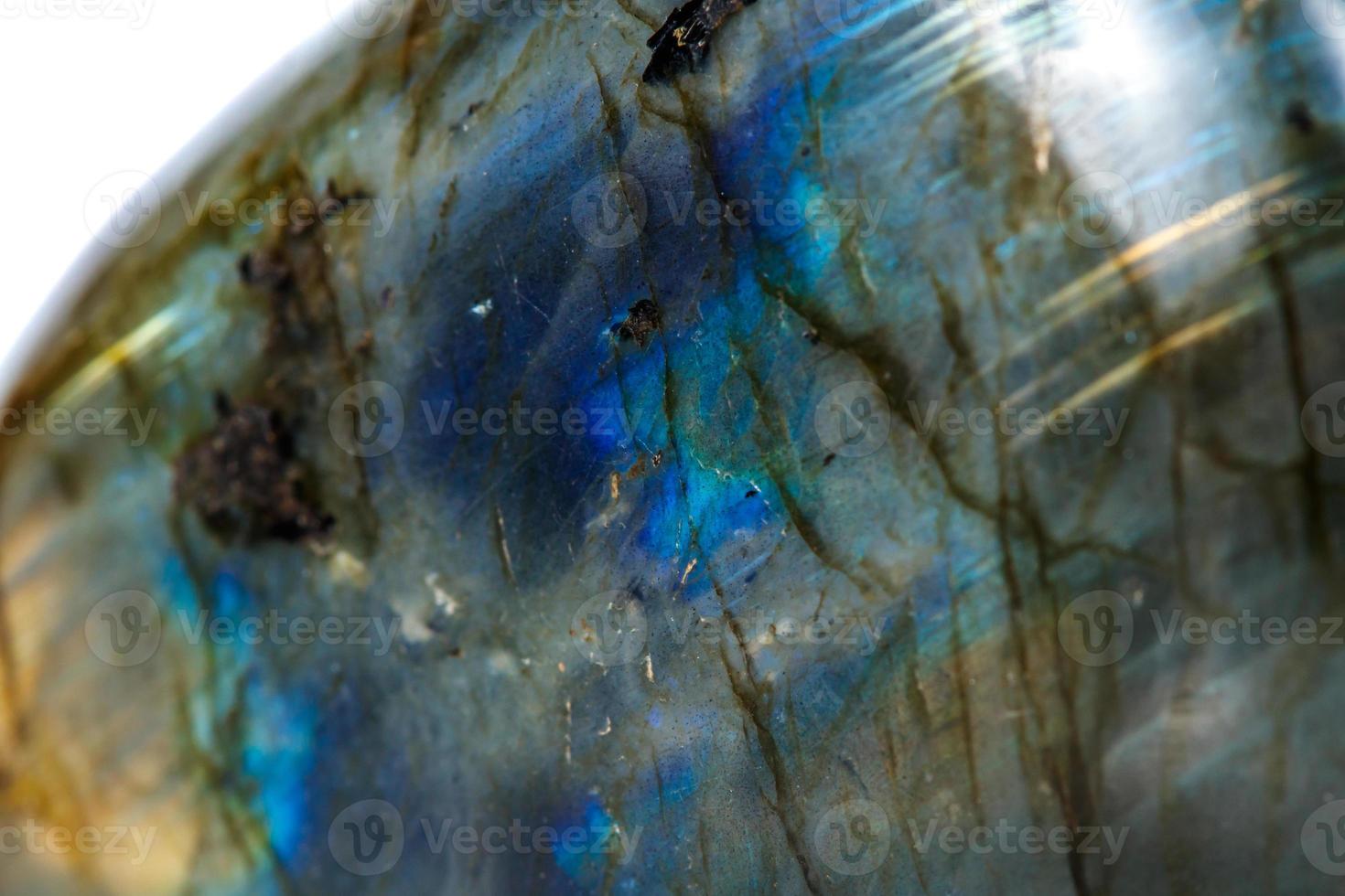 Macro mineral stone Labradorite on white background photo