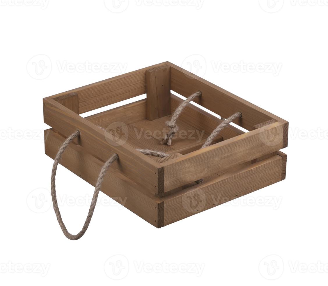 Wooden box with handles made of twine on a white background. photo