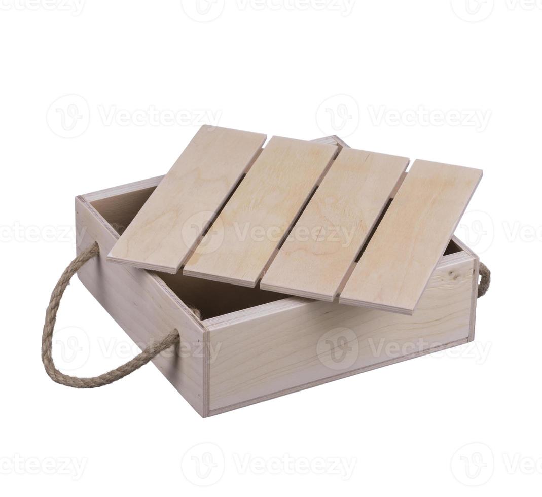 Wooden box with handles made of twine on a white background. photo