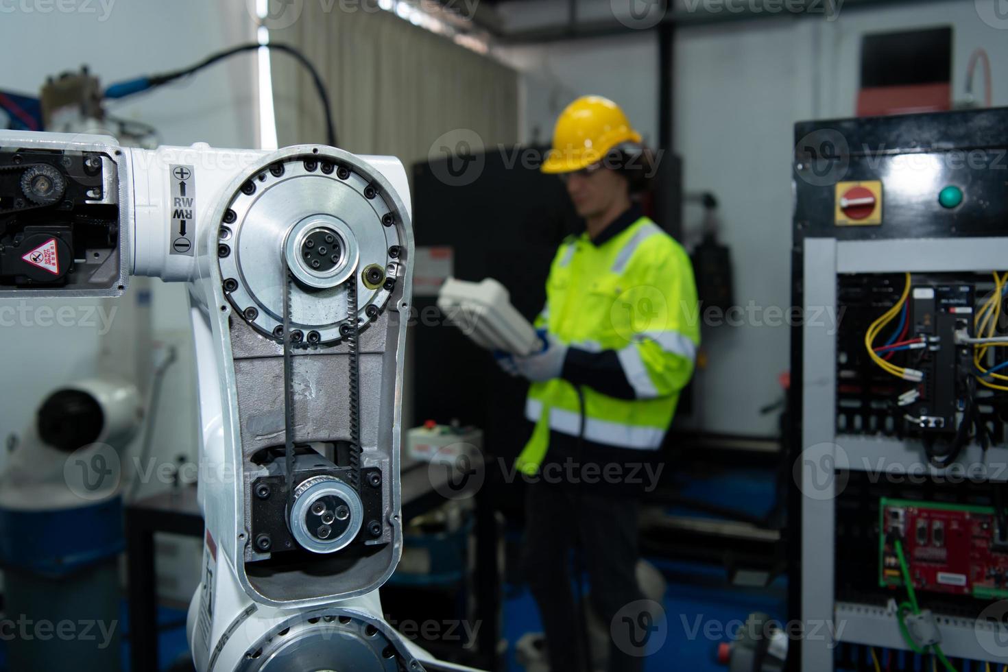 The circuit boards and sensors of a robotic hand are designed by a robotics engineer. in the Robotics Institute Research Center photo