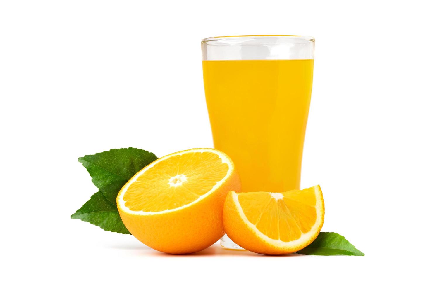 orange  juice in glass with fruit and green leaf isolate on white background photo