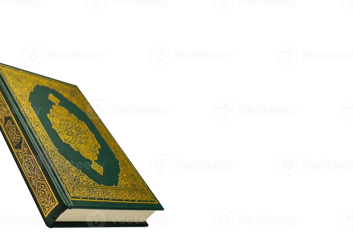 The Holy Al Quran with written arabic calligraphy meaning of Al Quran and rosary beads or tasbih on white background, isolated with copy space. photo