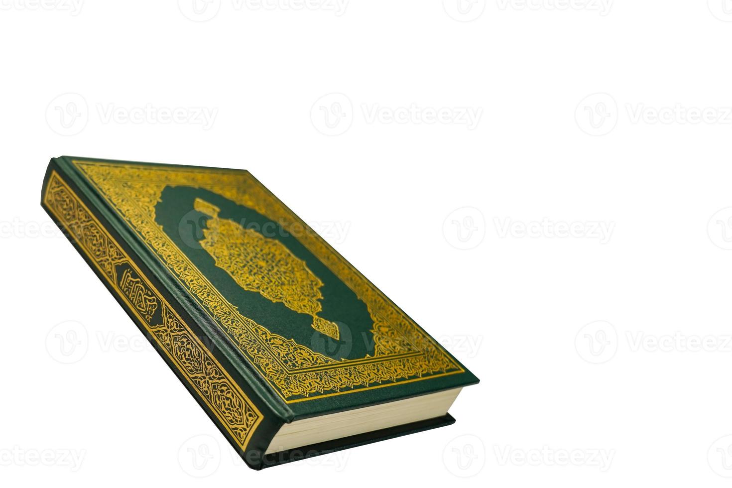 The Holy Al Quran with written arabic calligraphy meaning of Al Quran and rosary beads or tasbih on white background, isolated with copy space. photo