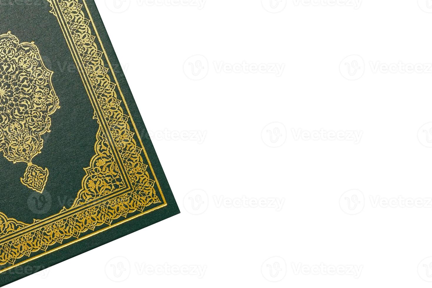 The Holy Al Quran with written arabic calligraphy meaning of Al Quran and rosary beads or tasbih on white background, isolated with copy space. photo