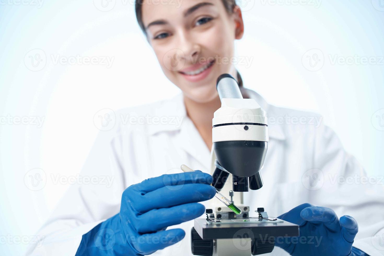 woman microscope biotechnology research laboratory science photo