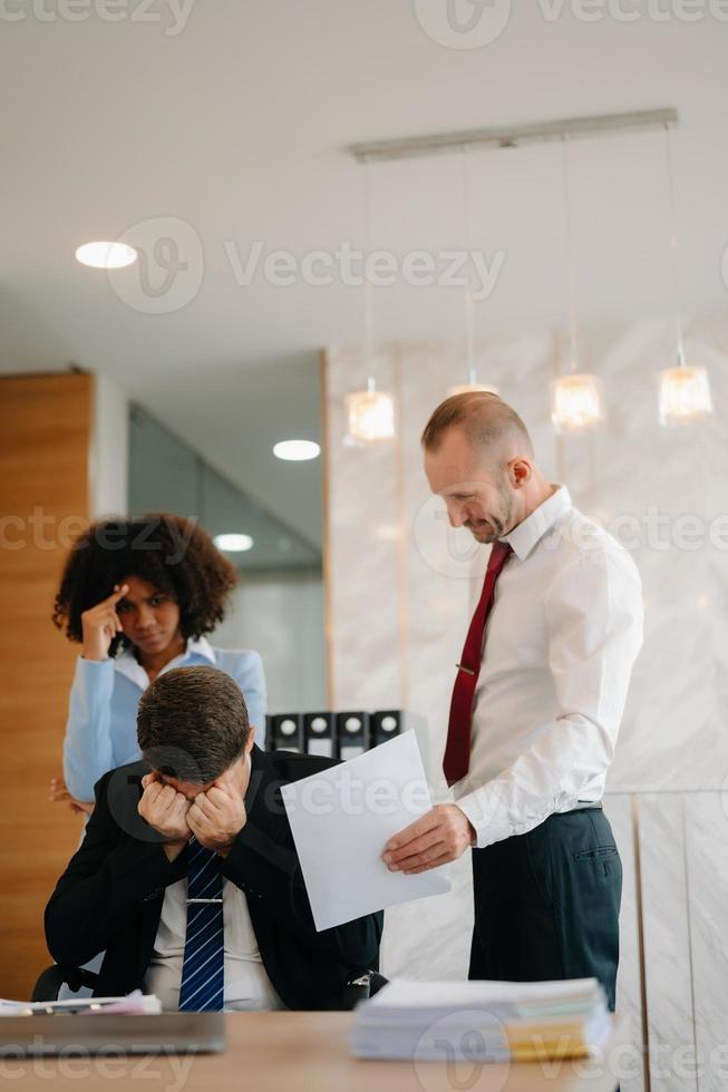Team thinking of problem solution at office meeting, sad diverse business people group shocked by bad news, upset colleagues in panic after company bankruptcy concept photo