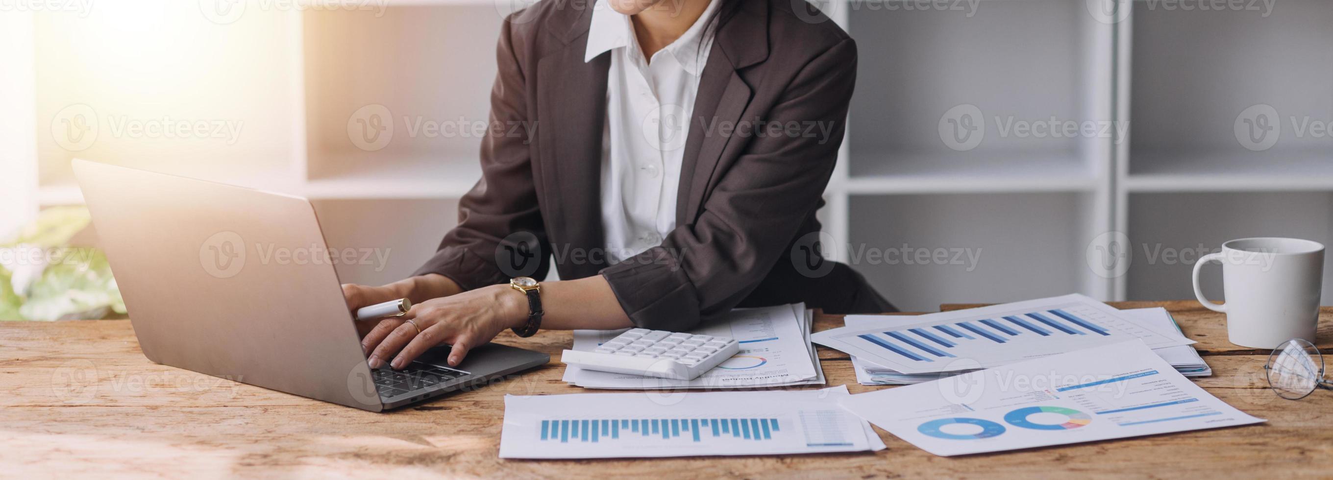 Close up bookkeepers working with balance sheet to analyze problems and find solutions to bringing develop business organization and company's stock market system. Common stock and preferred stock. photo