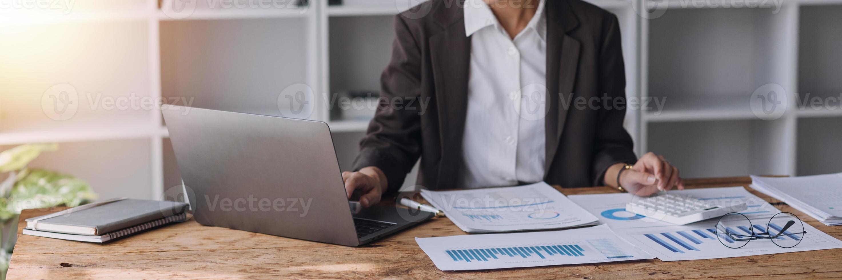 Close up bookkeepers working with balance sheet to analyze problems and find solutions to bringing develop business organization and company's stock market system. Common stock and preferred stock. photo