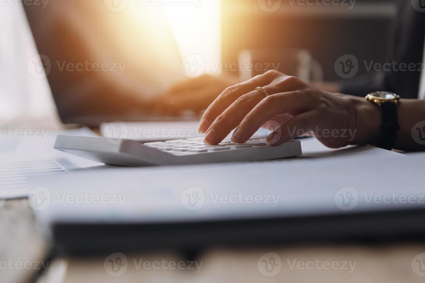 Close up bookkeepers working with balance sheet to analyze problems and find solutions to bringing develop business organization and company's stock market system. Common stock and preferred stock. photo