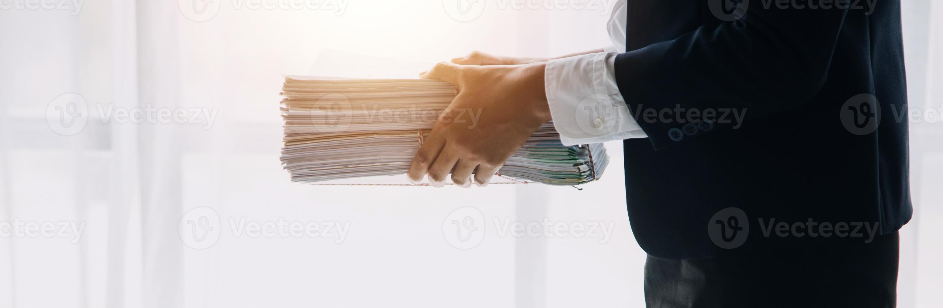 Financial analysts analyze business financial reports on a digital tablet planning investment project during a discussion at a meeting of corporate showing the results of their successful teamwork. photo