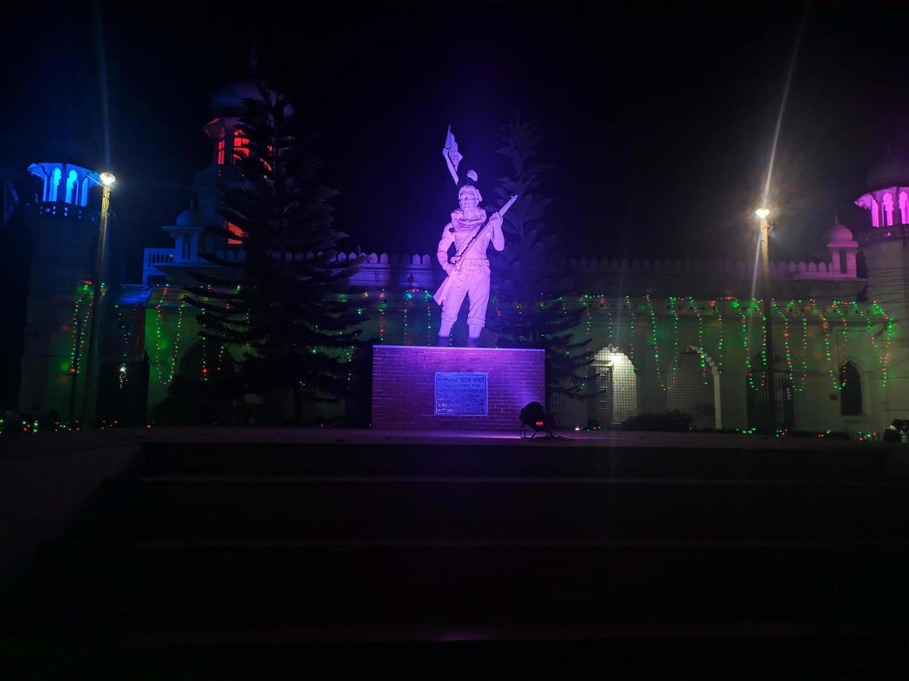 Rangpur, Bangladesh 2023. Statue Night view. Memorial of Independence War of Bangladesh Designed by Samira Khanom Shyamoli.One of the iconic sight of Carmichael College Rangpur. photo