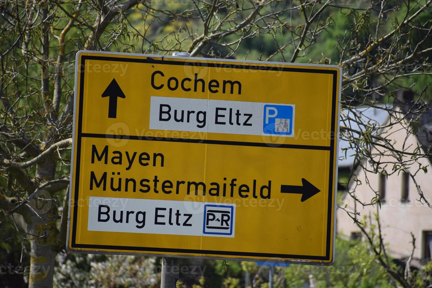 Traffic Sign to Towns and a Castle photo