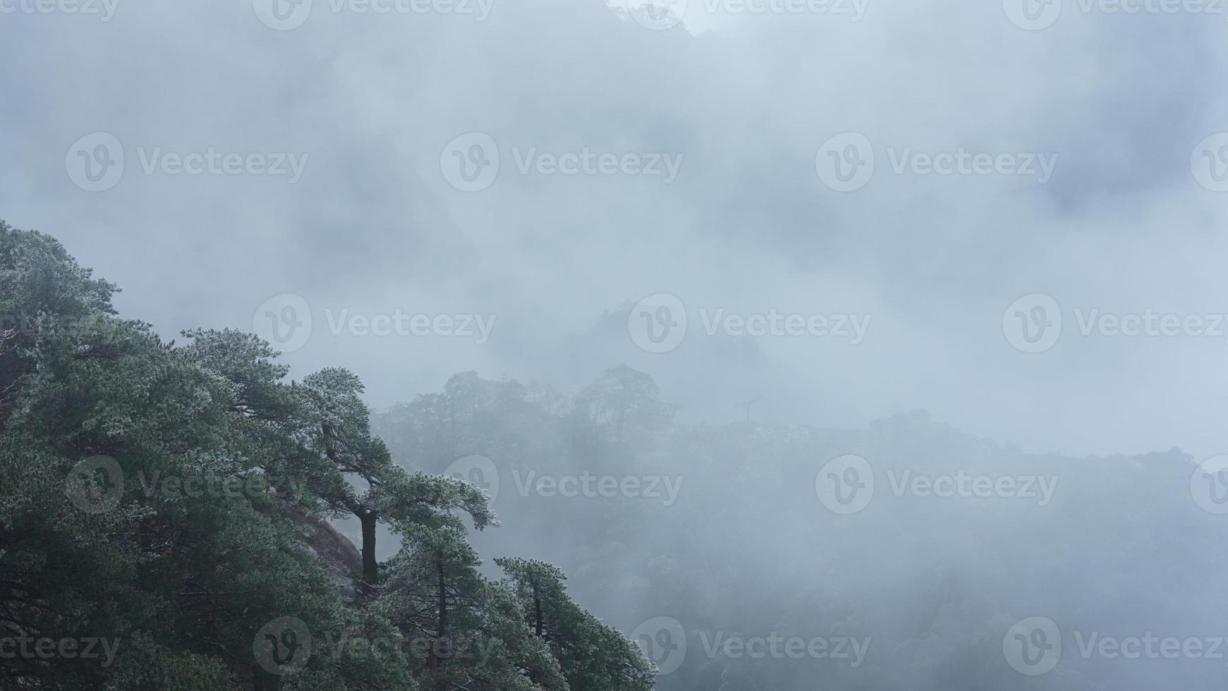 The beautiful mountains landscapes with the green forest and the erupted rock cliff as background in the countryside of the China photo