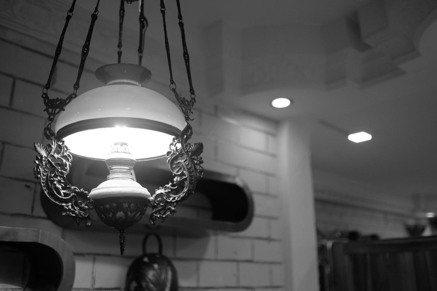 a unique old hanging lamp with artistic moslem photo