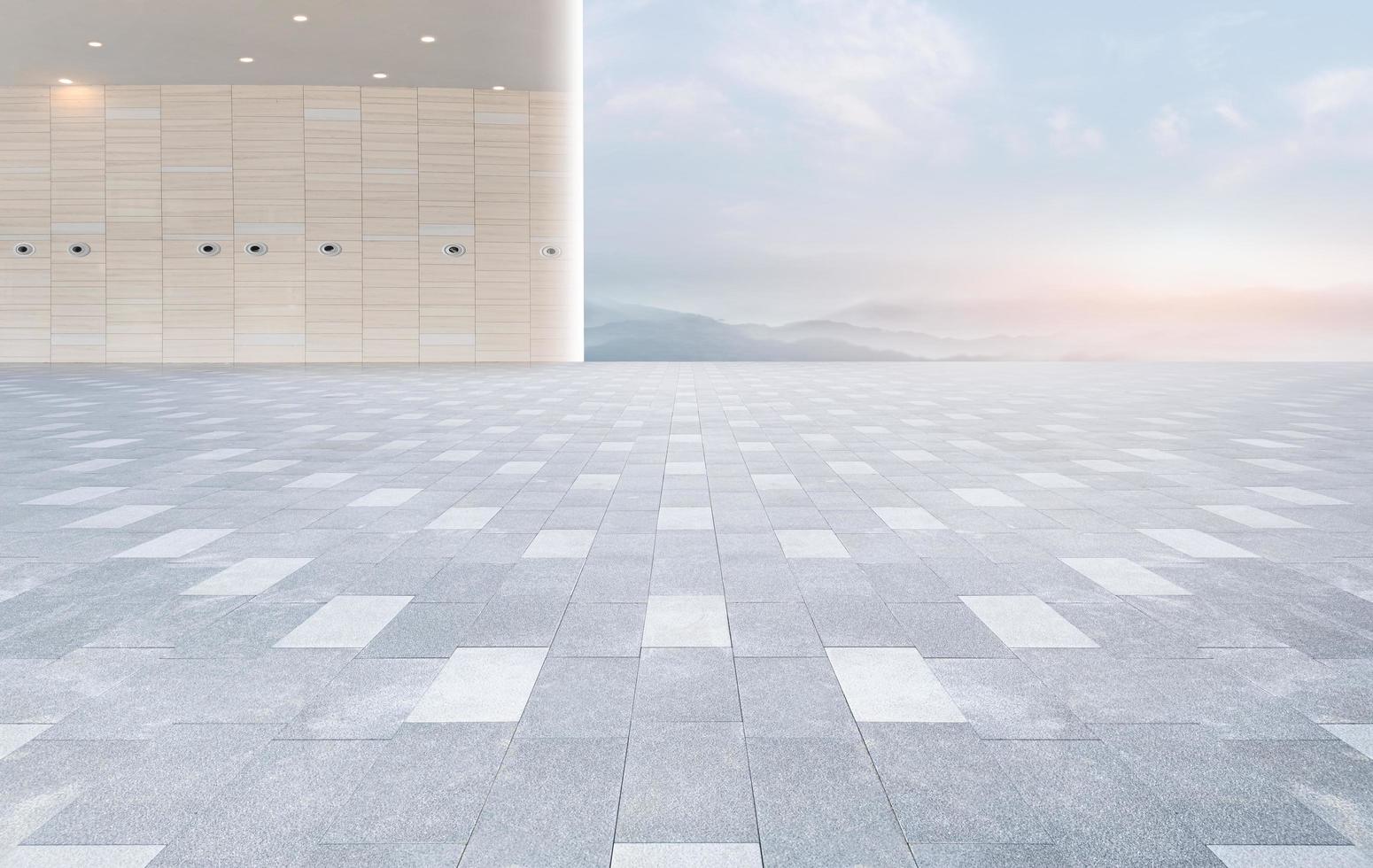 Modern building with unmanned brick square ground background photo