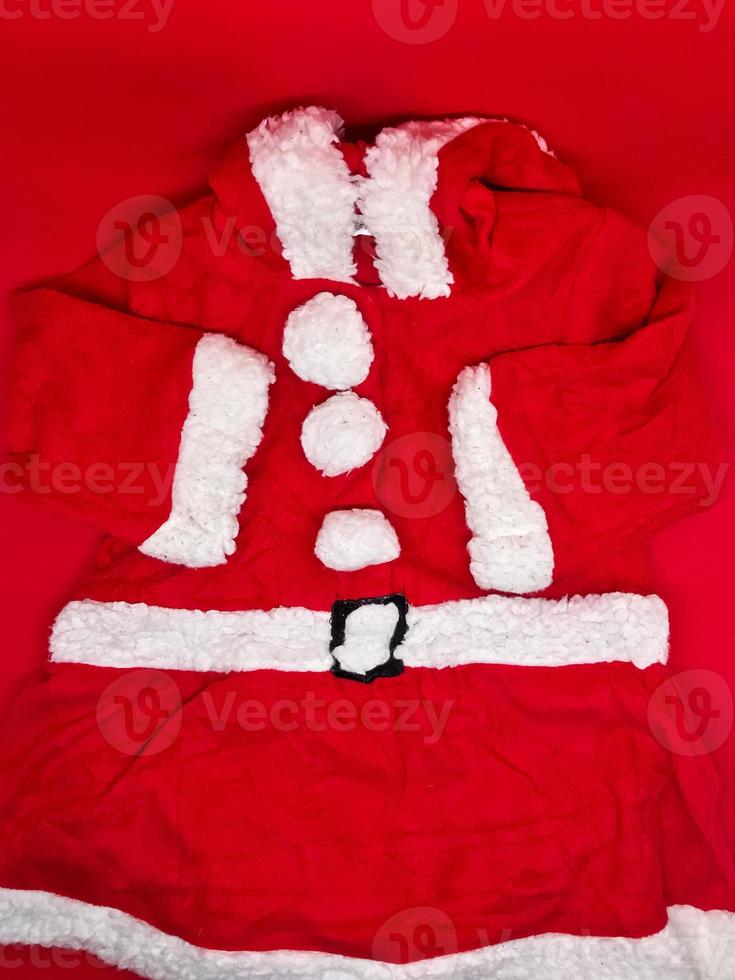 Santa Cloth for young children, insulated with a red background photo