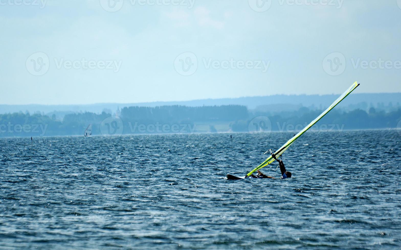 windsurfing on the bay of pucka on the baltic sea photo