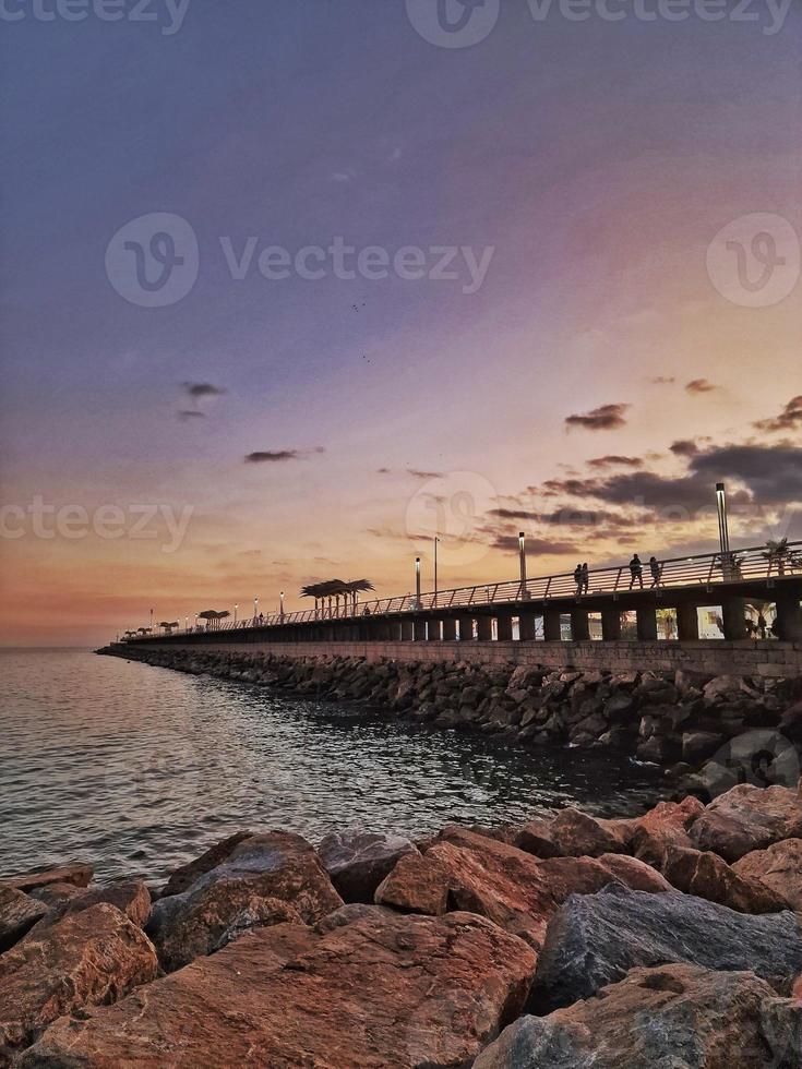 l sunset landscape of alicante spain with pier photo