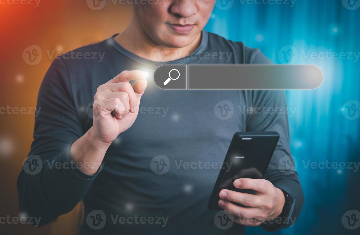 Information search technology, search engine optimization, male hand using a smartphone to search information, using the search bar function on your website photo