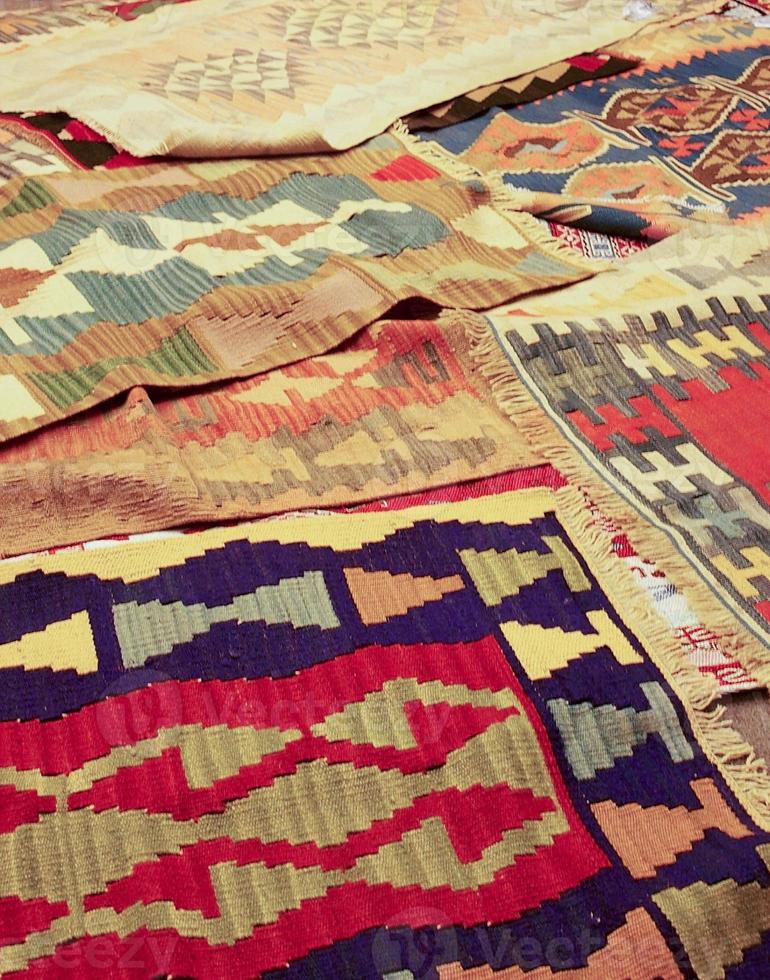 interesting background with handmade Turkish rugs in close-up photo