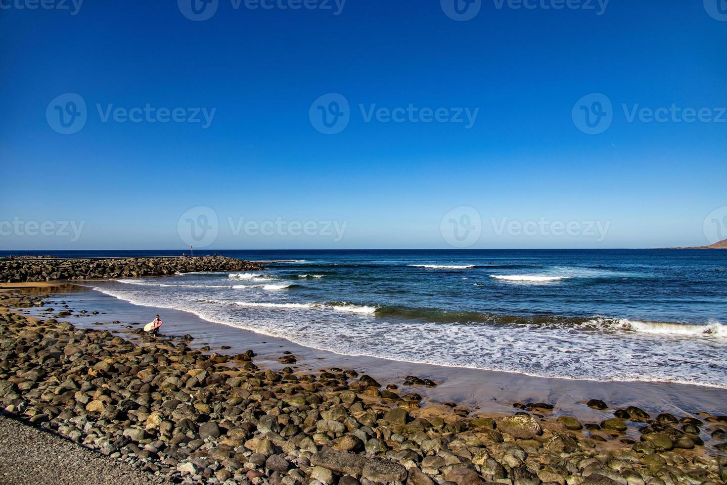 warm beach landscape in the capital on the Spanish Canary Island Gran Canaria on a clear day photo