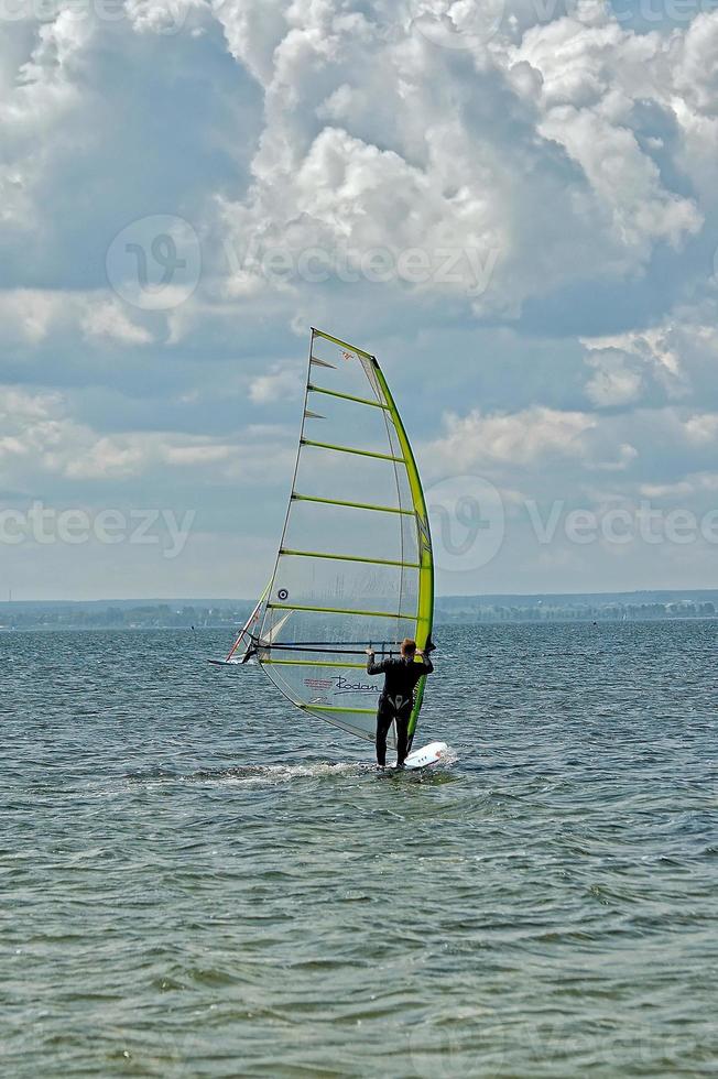 windsurfing on the bay of pucka on the baltic sea photo