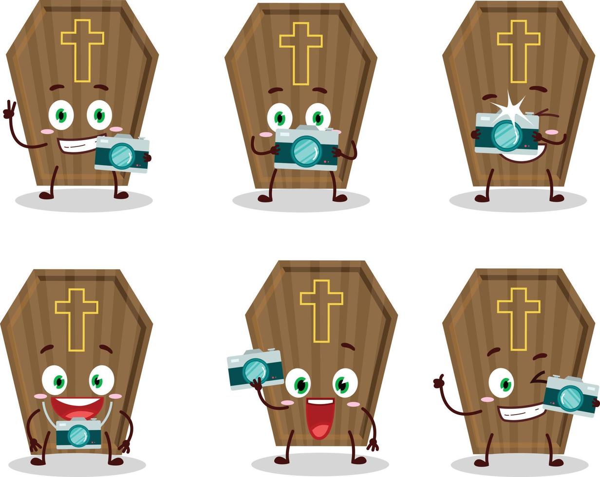 Photographer profession emoticon with coffin cartoon character vector