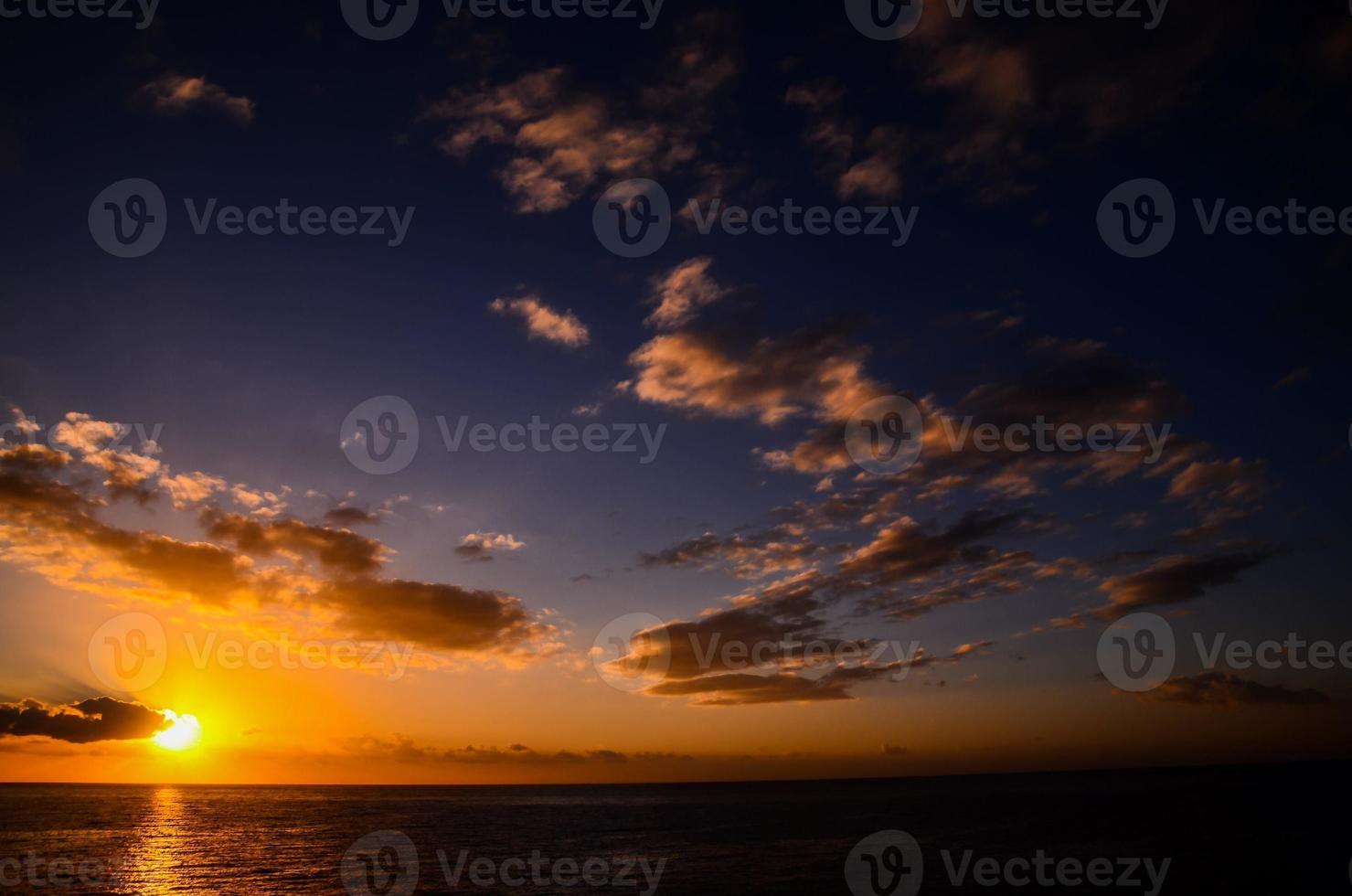 Sunset over the sea photo