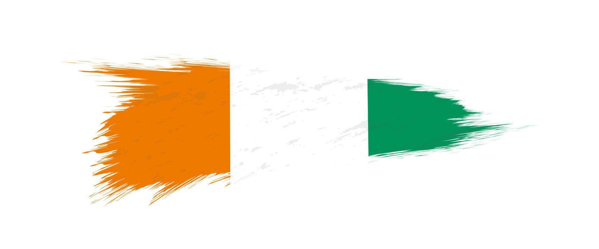 Flag of Ivory Coast in grunge brush stroke. vector