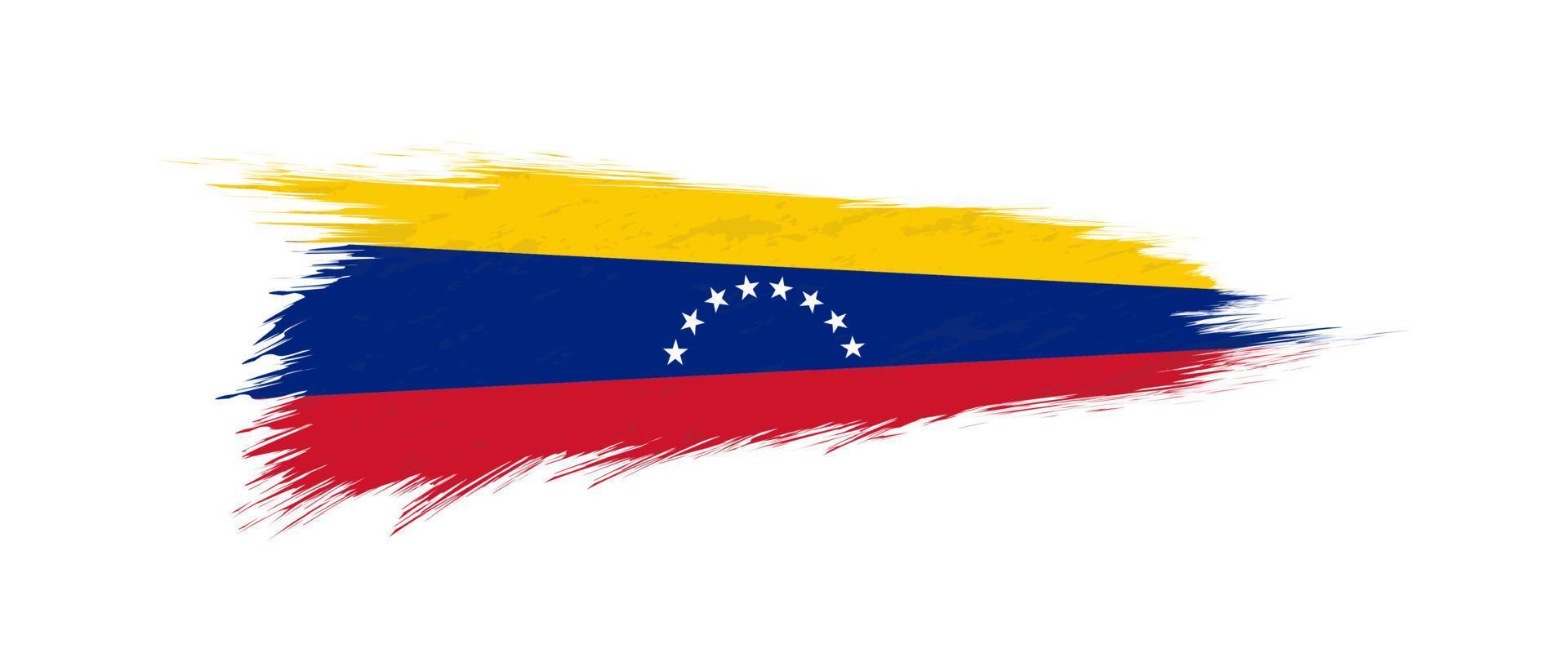 Flag of Venezuela in grunge brush stroke. vector