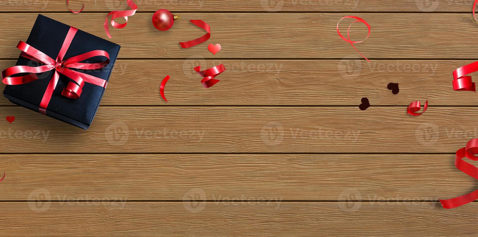 Black gift box with red ribbon on background. Holiday concept, Valentine's Day. Congratulations background photo