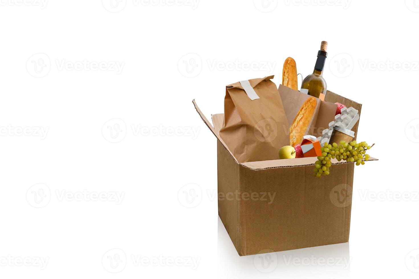 Fruits and vegetables crates and boxes in delivery van photo