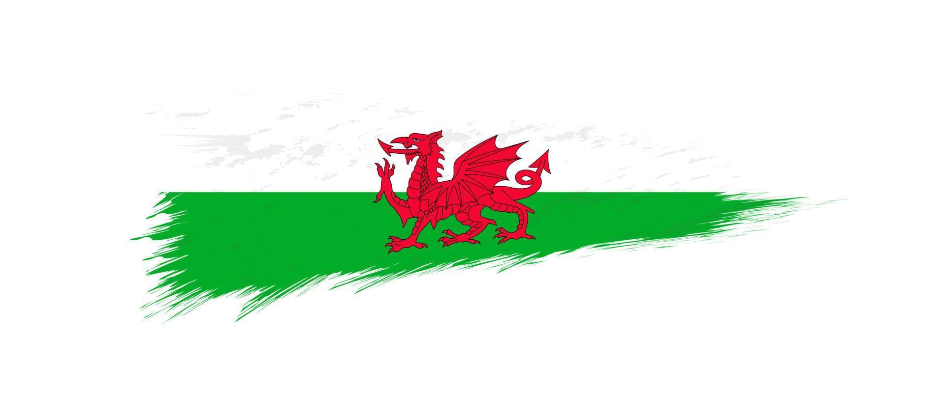 Flag of Wales in grunge brush stroke. vector