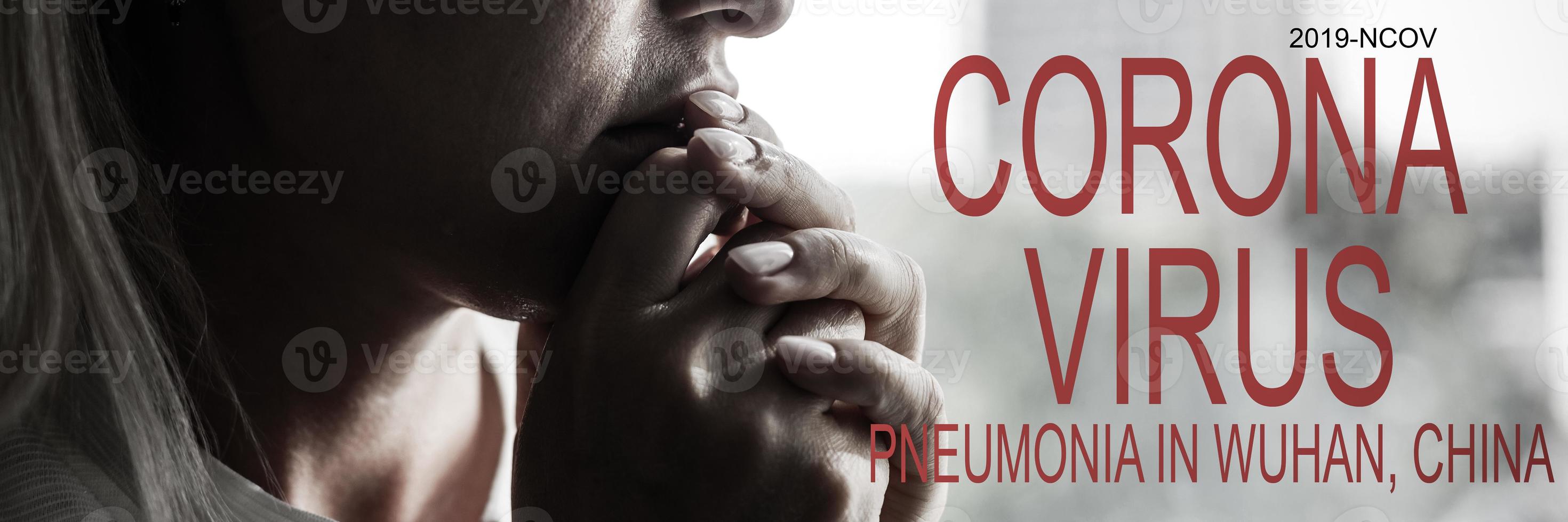 Praying Woman because of the corona virus photo