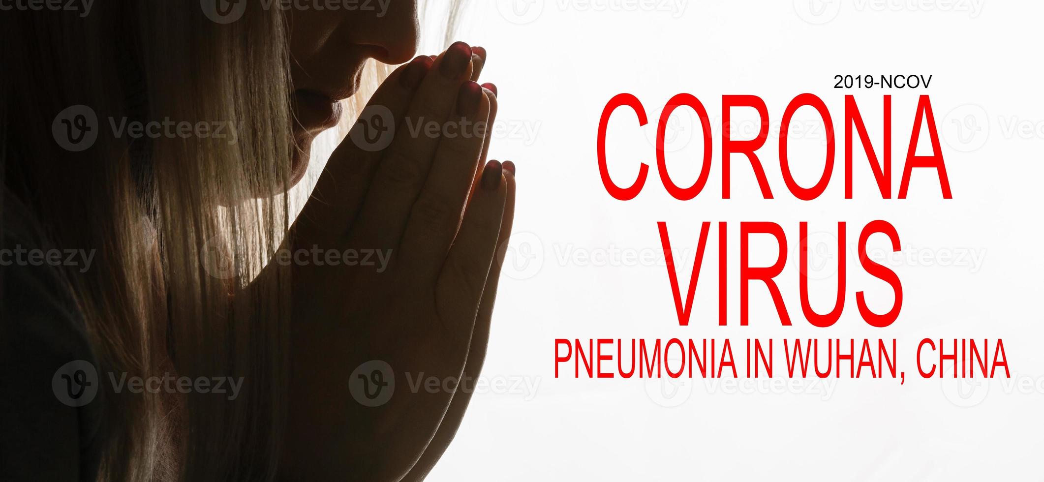 woman prays because of corona virus. Sick Woman photo