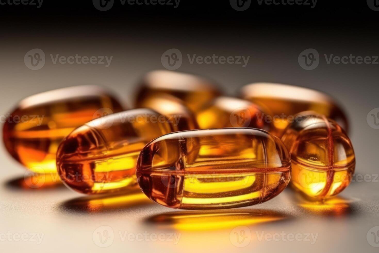 yellow cbd oil cannabis capsules, golden pills photo