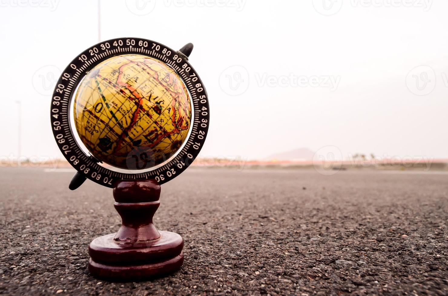 Globe on the road photo