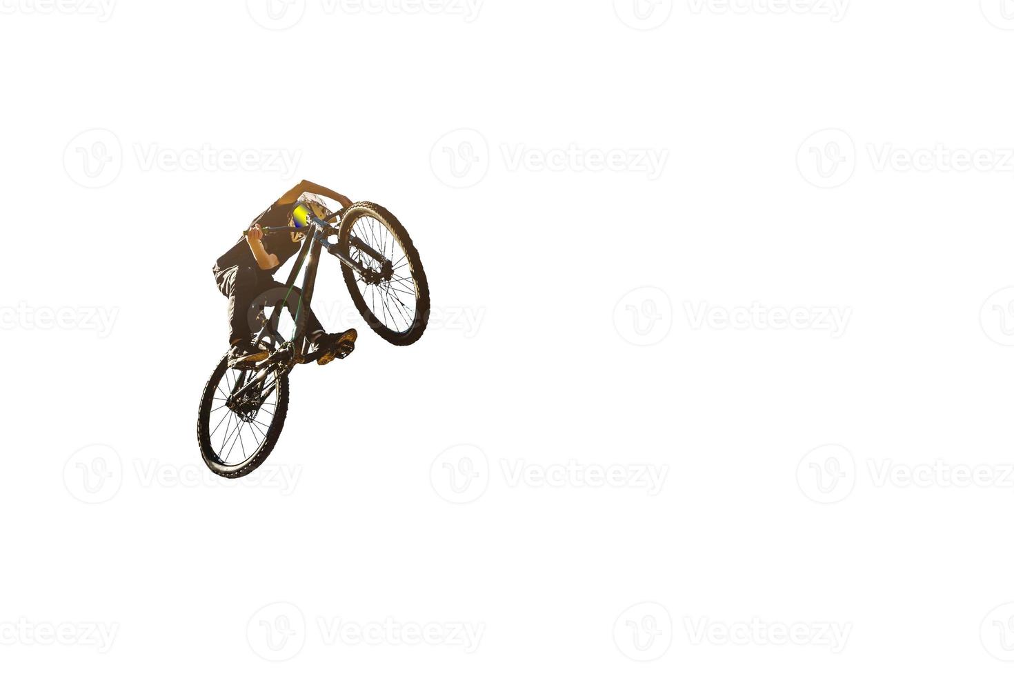 Young man riding a bicycle isolated on white background photo