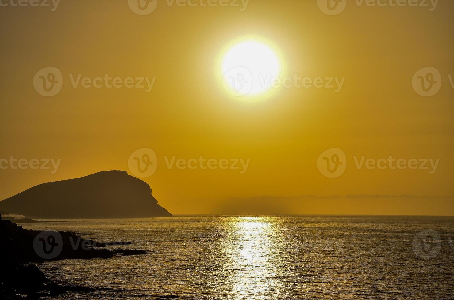 Sunset over the sea photo