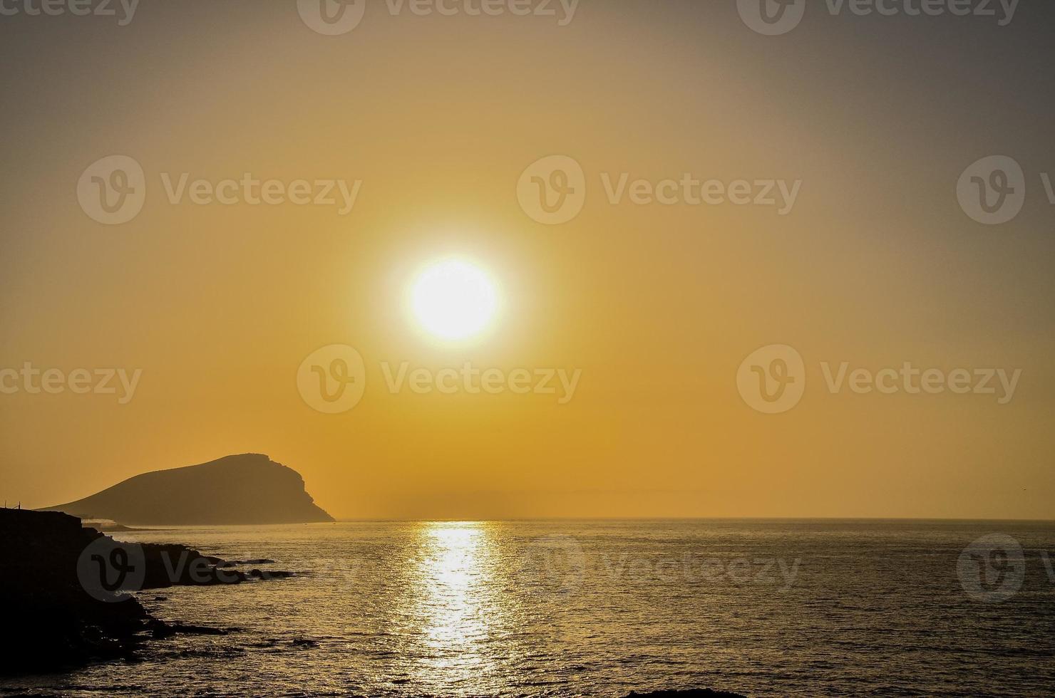 Sunset over the sea photo