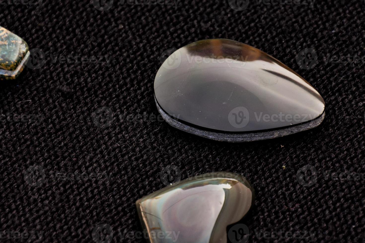 Gemstones on dark background photo