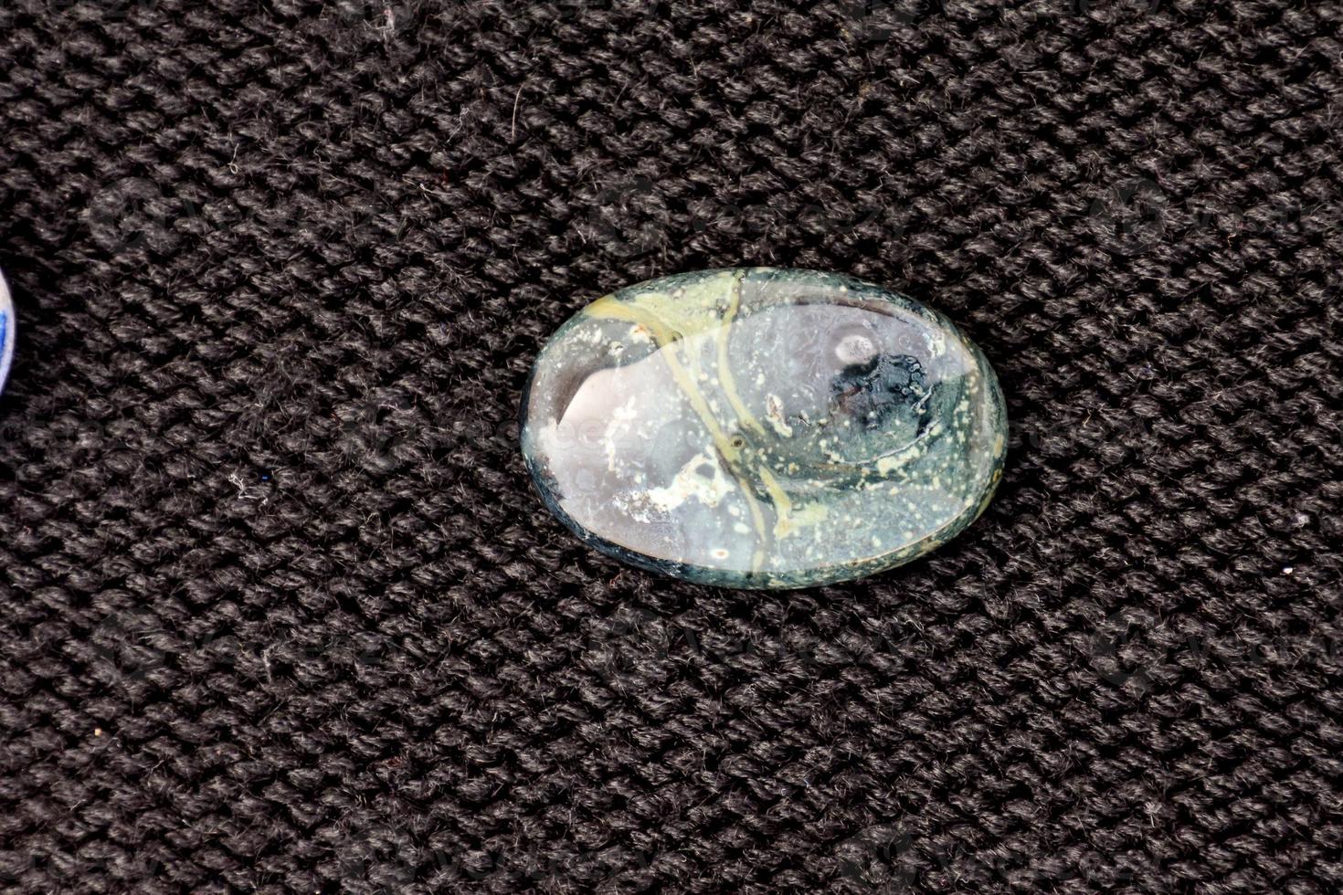 Gemstones on dark background photo